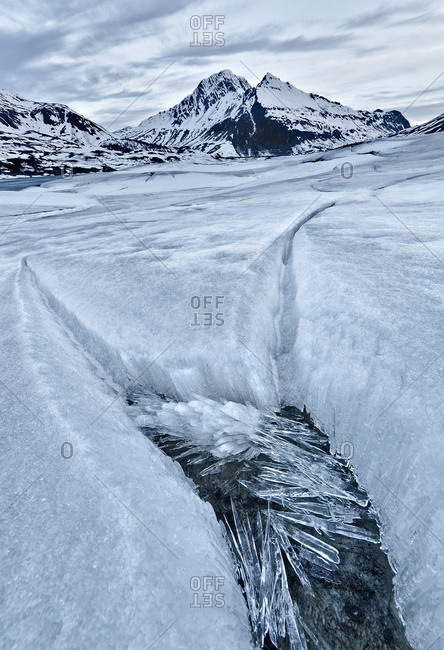 Ice formations at the bottom of the Mont Cenis lake dam in Savoie, France