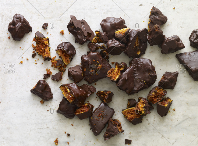 Chocolate-covered brittle candy broken into pieces