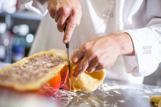 Chef prepping food in kitchen