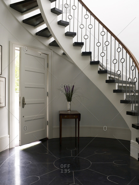 Entrance foyer and staircase in British designer Rosemary Hallgarten\'s converted barn, Westport, Connecticut, New England, USA