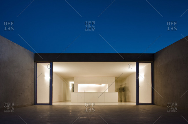 View into mountain house by Fran Silvestre set in rocks of Aroya, Valencia, Spain. Minimalist white design