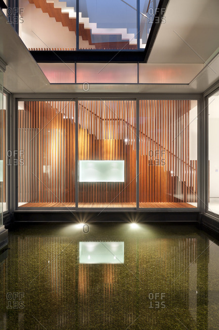 Lit internal water feature in residential house on Sentosa island, Singapore, South East Asia