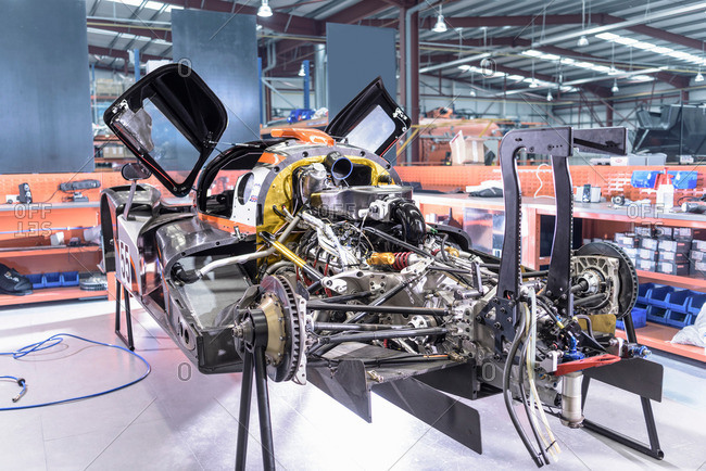Car under construction and repair in racing car factory