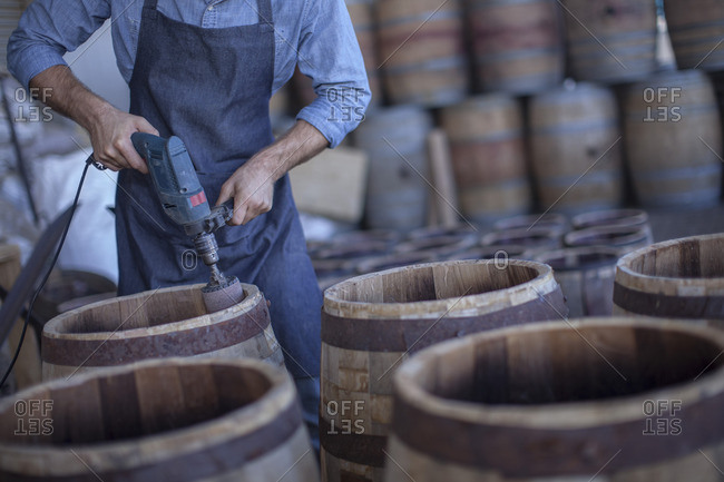 Cooper grinding wine barrel with grinder