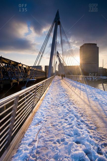 Snow on urban foot bridge