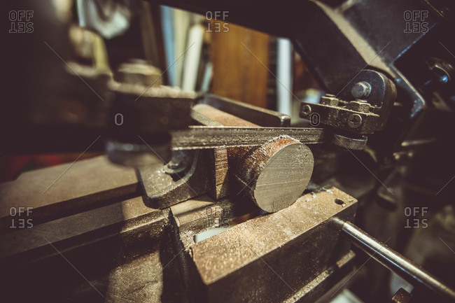 Close-up of machine cutting wood