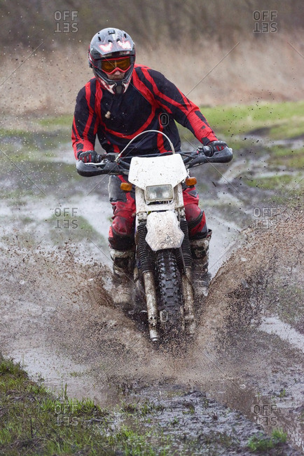 Extreme motocross racing on mud track