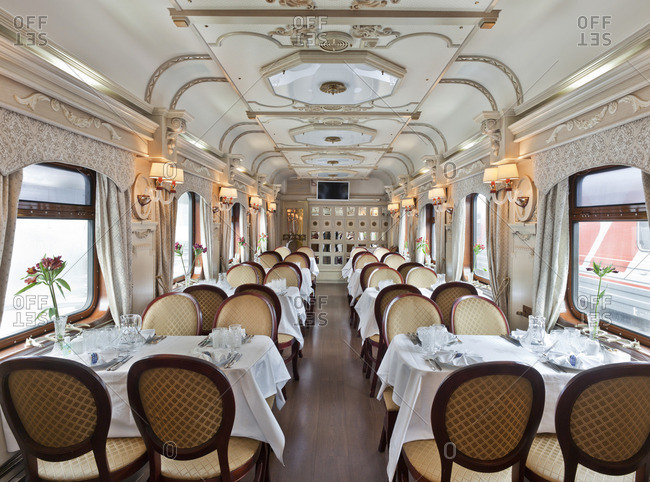An empty luxurious dining car on a train