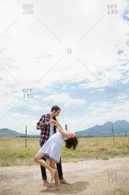Couple dancing in remote setting