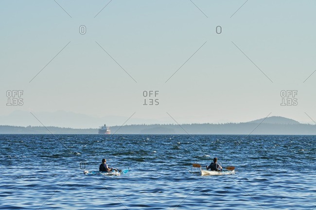 People kayaking in Pacific Northwest