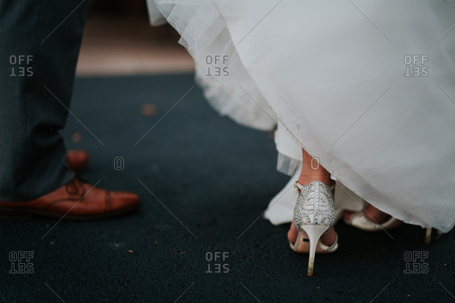 Bride and groom\'s feet