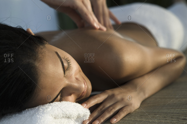 Woman enjoying back massage
