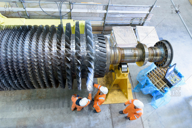 Overhead view of gas turbine under repair in gas-fired power station