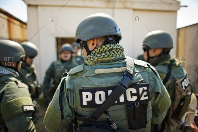 Military police wearing bullet proof vests.