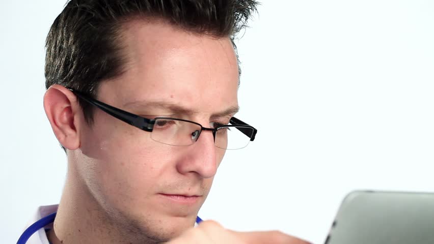 Doctor using tablet computer