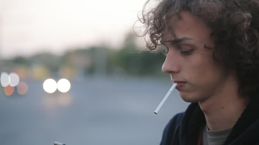 Curly haired smoking