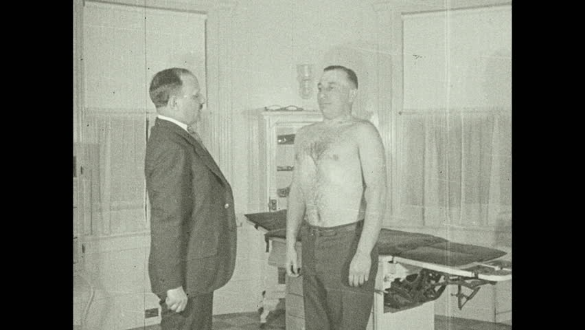 1930s Shirtless Man Doctor S Office Breathes Stock Footage Video 100
