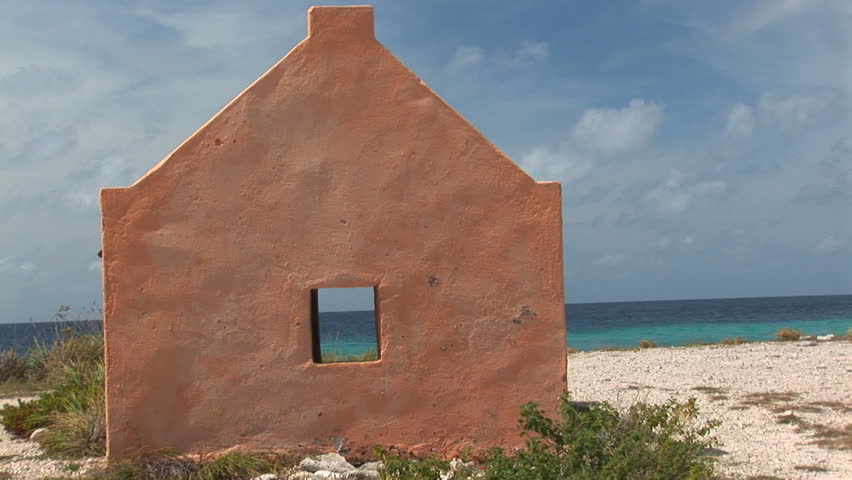 Red Slave Hut and beacon wit pan to right. Shot on Bonaire, Netherlands Antilles.