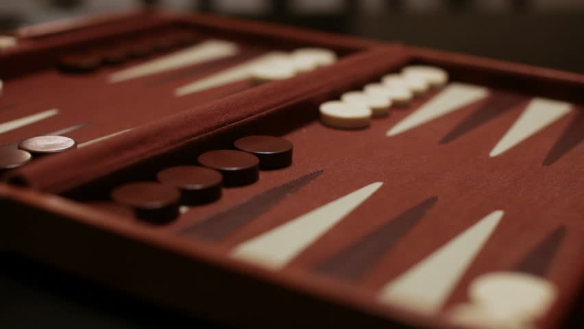 Player rolls a six and a one opening roll in a backgammon game