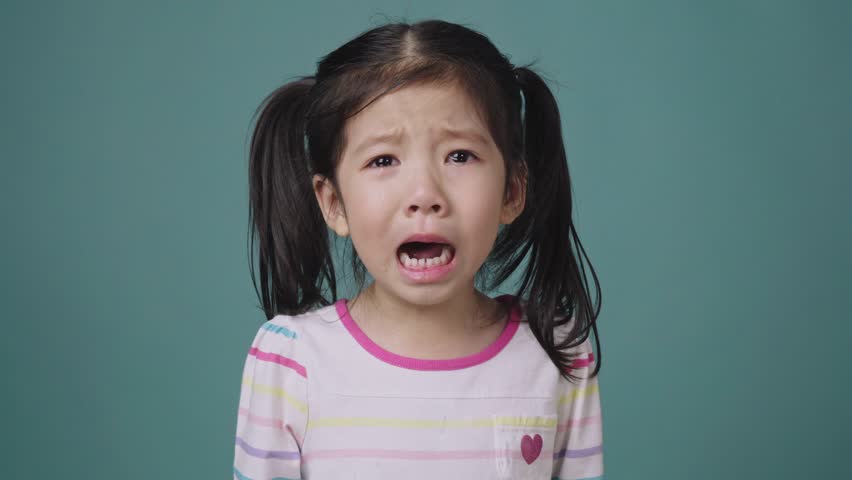 Asian girl cries mommy