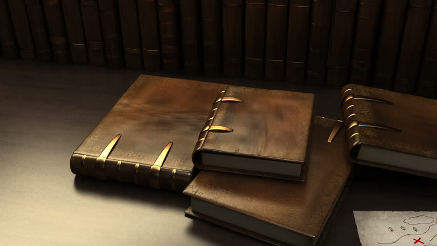 Pile of books on wooden table