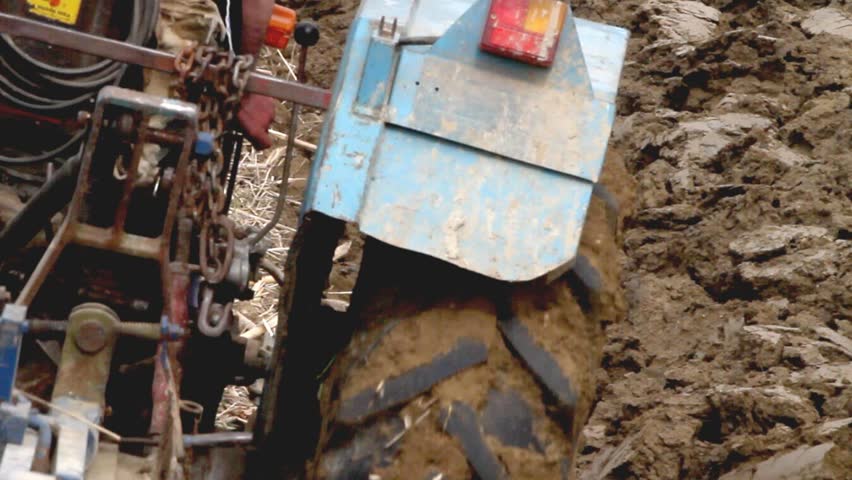 tractor plowing the land