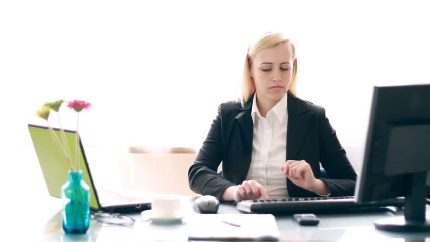Busy multitasking attractive businesswoman in the office timelapse