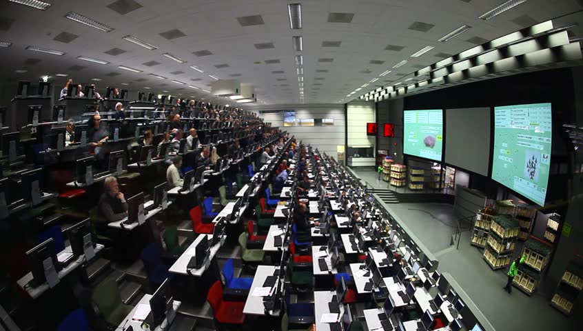 AALSMEER, THE NETHERLANDS-APRIL 27: Auction Room of FloraHolland, April 27, 2011, Aalsmeer, The Netherlands. Aalsmeer Flower Auction is the largest flower auction in the world; Around 20 million flowers are sold in FloraHolland Aalsmeer every auction day