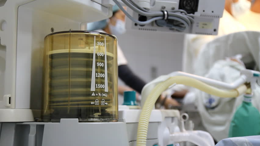 Patient hooked to ventilator during surgery