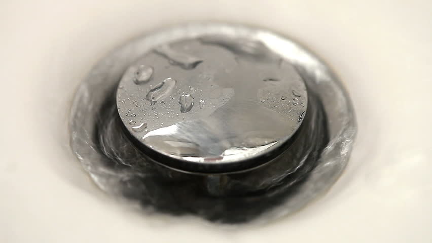 Water in white sink plug