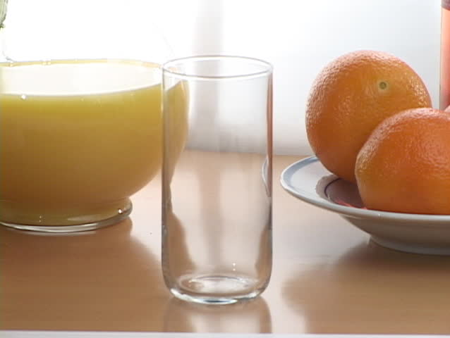 Orange juice poured in a glass