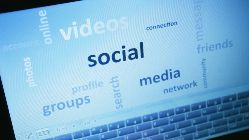 social media and connected words on touch-screen tablet-pc with finger touching screen and arranging