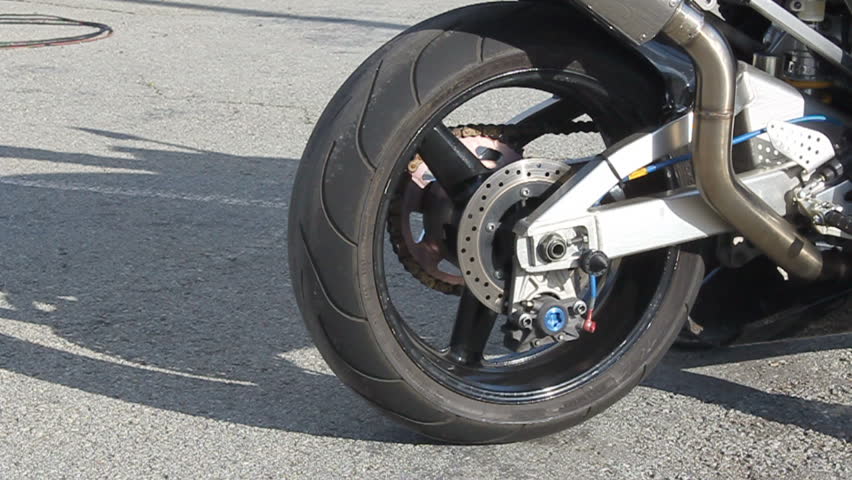 super sport motorcycle doing a tire burnout