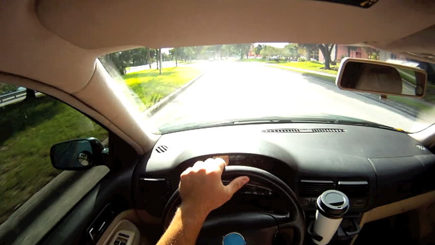 Person driving and texting on the phone