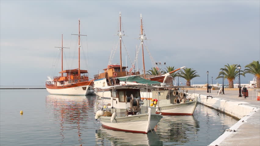 port with fishing boat and sailboat Neos Marmaras Sithonia Halkidiki Greece
