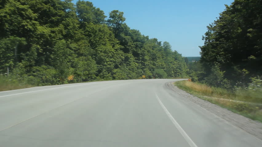 Passing a recreation camper on a rural road. Ontario, Canada. 
