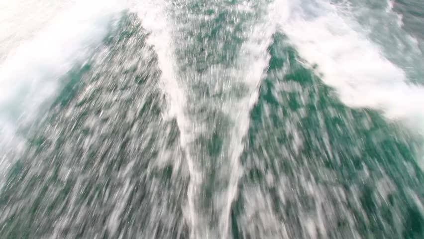 Wake behind the power boat 