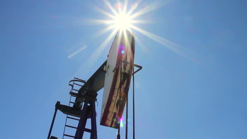 Crude oil pump jack with sunburst