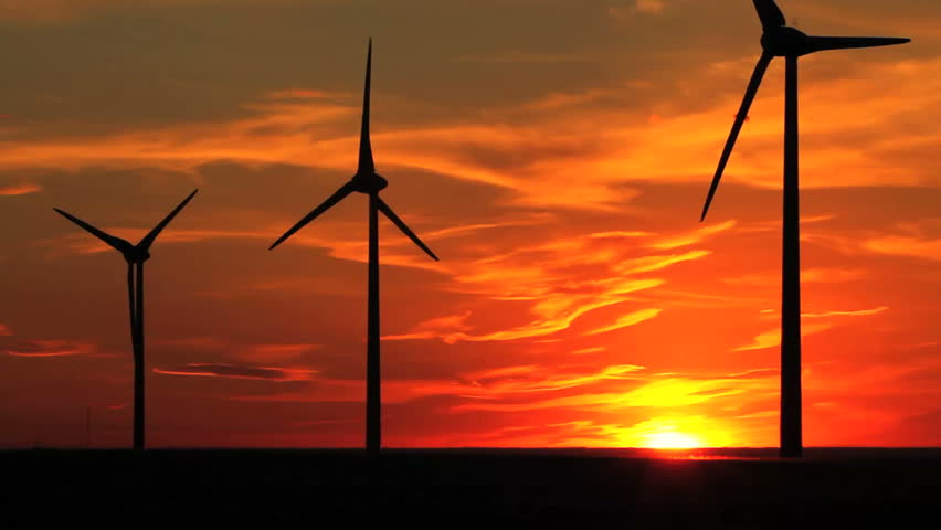 Wind turbines at sunset