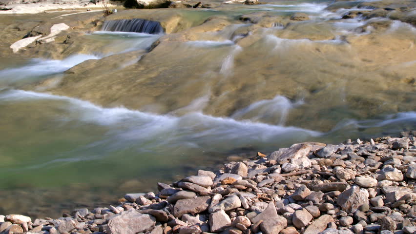 River flowing onthe pebble coast in Zarecki krov