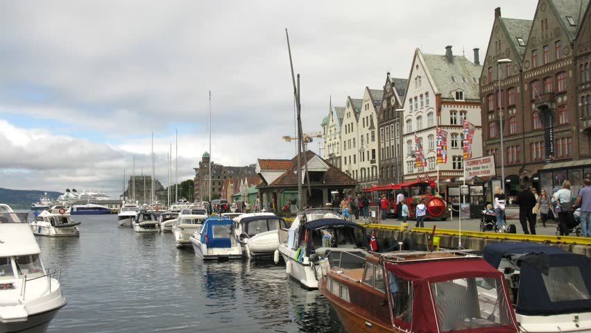 BERGEN, NORWAY- JUNE 27: (Timelapse View) Port of old Hanseatic district Bryggen on June 27, 2011 in Bergen, Norway. Bryggen has since 1979 been on the UNESCO list for World Cultural Heritage sites. 