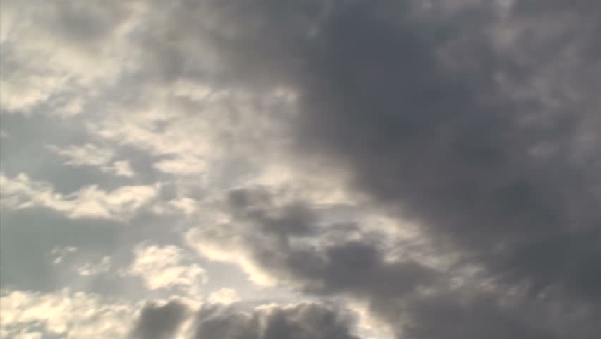 Timelapse footage of clouds in a blue sky