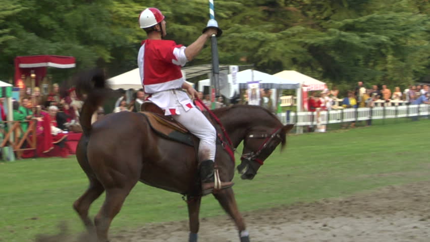 COMO, ITALY - CIRCA SEPT 2011:  Palio del Baradello re-enacts Barbarossa's visit to his allies in Como after defeating Milan in the 1159 battle, circa Sept 2011, Como, Italy. Period dances, games and shows create a medieval atmosphere at this annual event