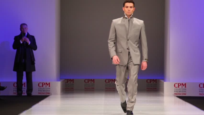 MOSCOW - FEBRUARY 22: Man wears light suit from Slava Zaytzev and walks in catwalk in Collection Premiere Moscow, on February 22, 2011 in Moscow, Russia. Slava Zaitsev Fashion House was founded Moscow in 1982. 
