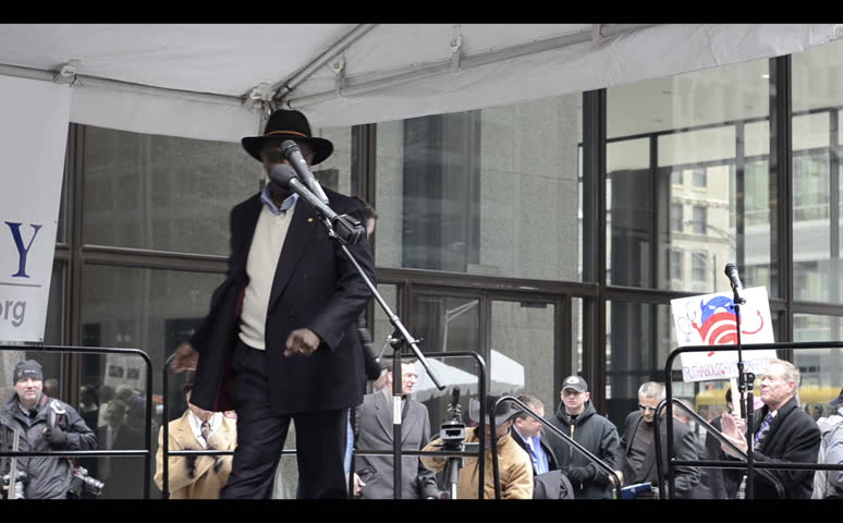 CHICAGO, IL - APRIL 18: Presidential Candidate Herman Cain speaking opening remarks at the tea party rally in Chicago's Daley Plaza April 18, 2011, Chicago Illinois. 