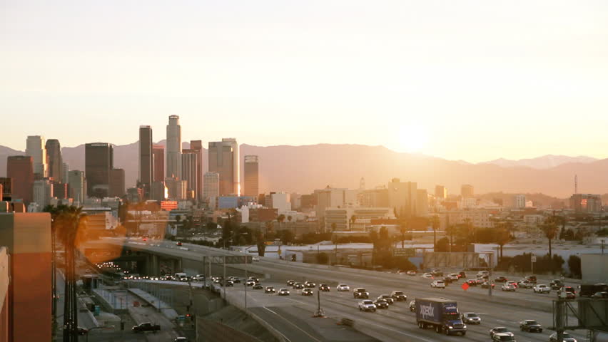 Time-lapse of multiple freeway overpasses (native color, late dawn)