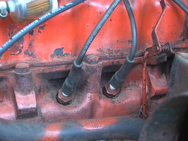 Spark Plug Removal By Ratchet And Socket On A 4 Cylinder Old Engine