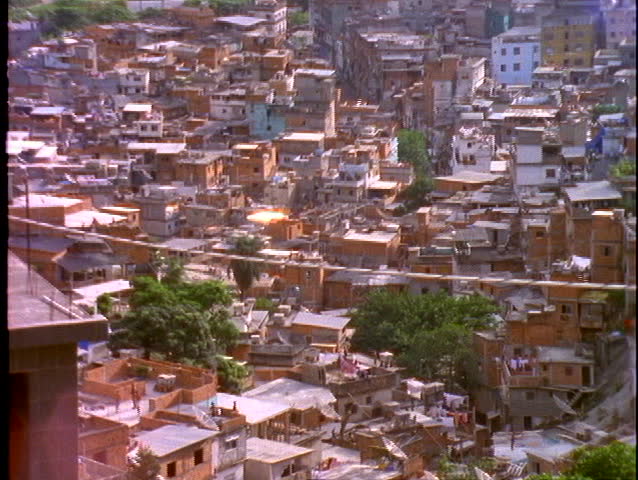 Debris flies in the air over a slum in Rio De Janeiro, Brazil.