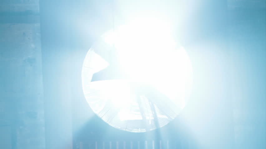 Strobing, slow rotating ventilation fan (light blue tinge)