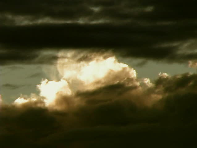 Dark clouds tumble across frame (time-lapse)